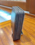 Pre Owned Set Of 6 Leather Coasters with a Sterling Silver Stand