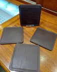 Pre Owned Set Of 6 Leather Coasters with a Sterling Silver Stand