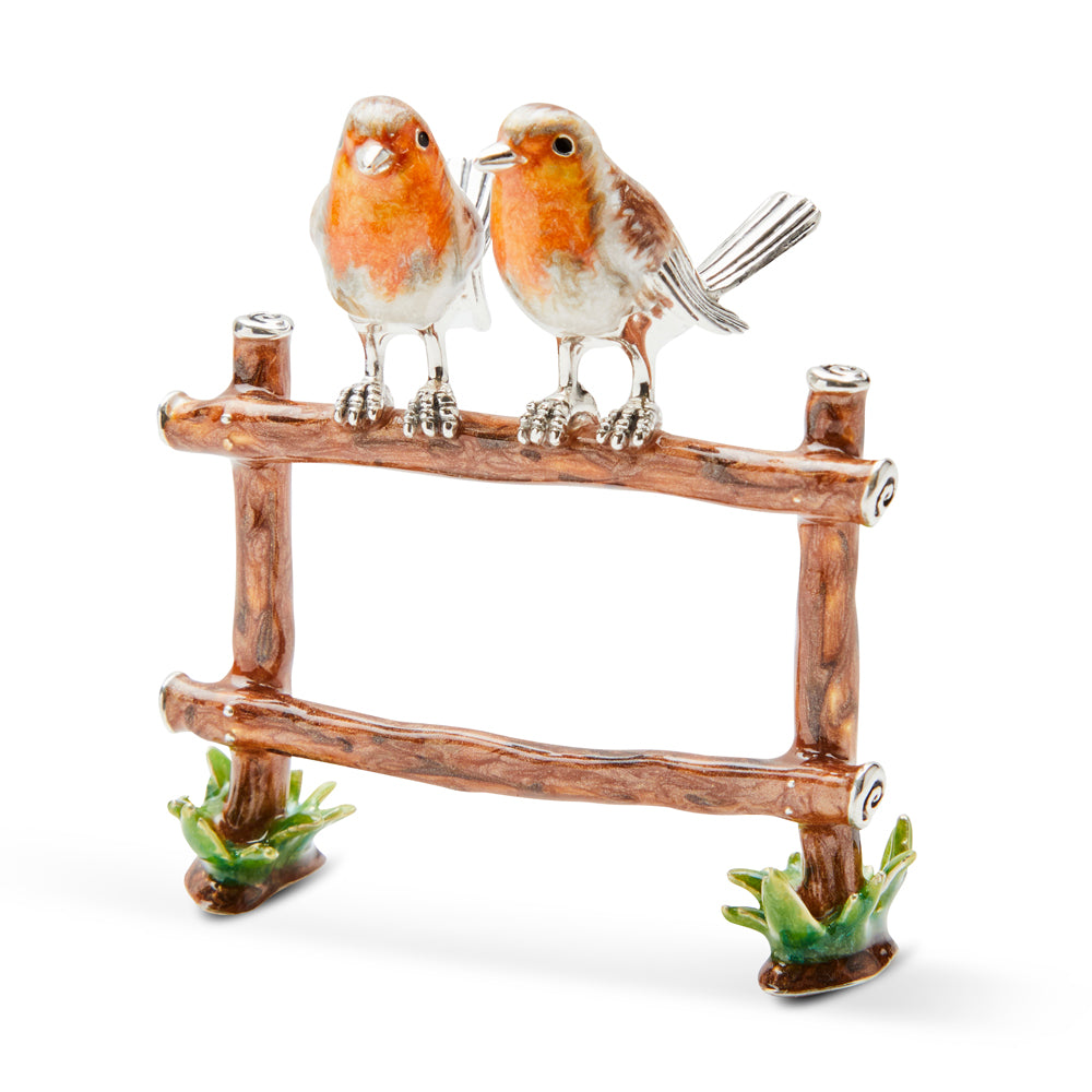 Silver and Enamel Robins on a Fence